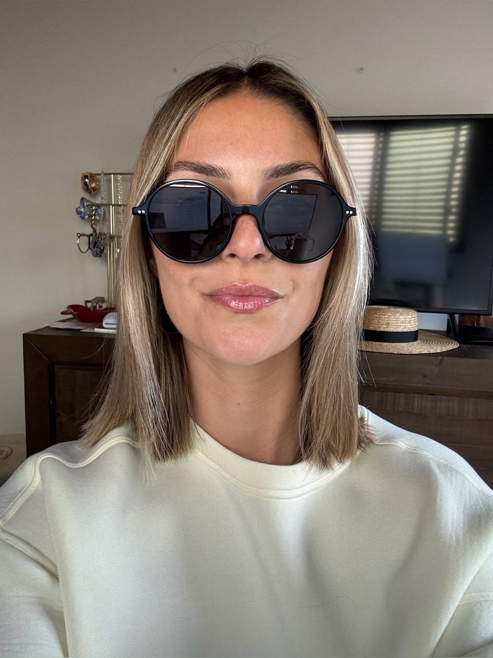 Round Black Sunglasses with Brown Case
